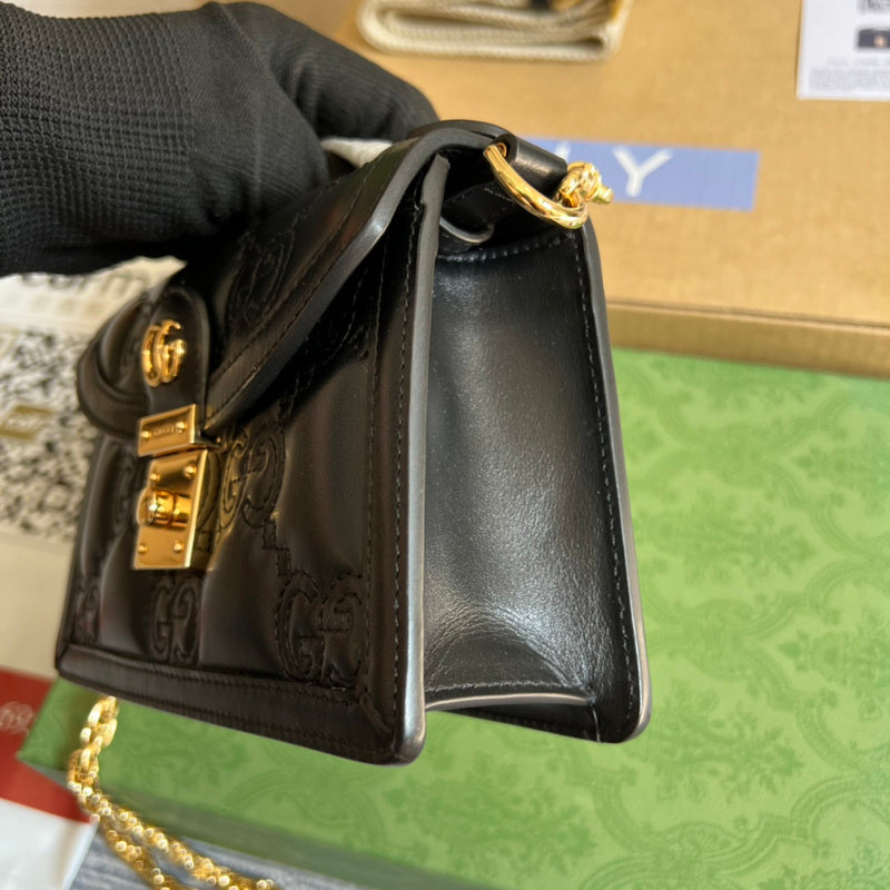 Side view of clean-lined structured handbag
