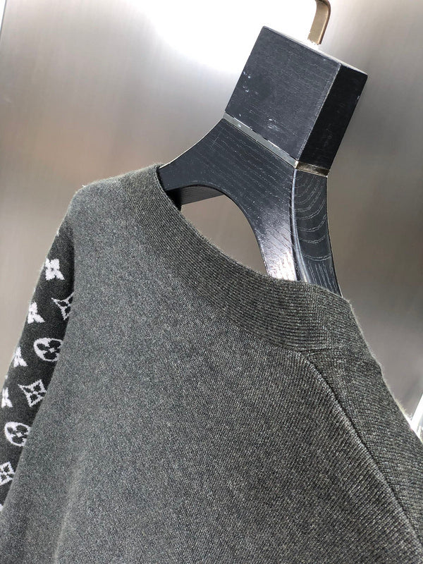 Side profile of Louis Vuitton luxury clothing with signature branding