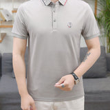 Front view of Moncler luxury clothing with logo-detail design