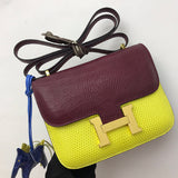 Side view of clean-lined structured handbag