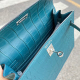 Side view of minimalist structured handbag