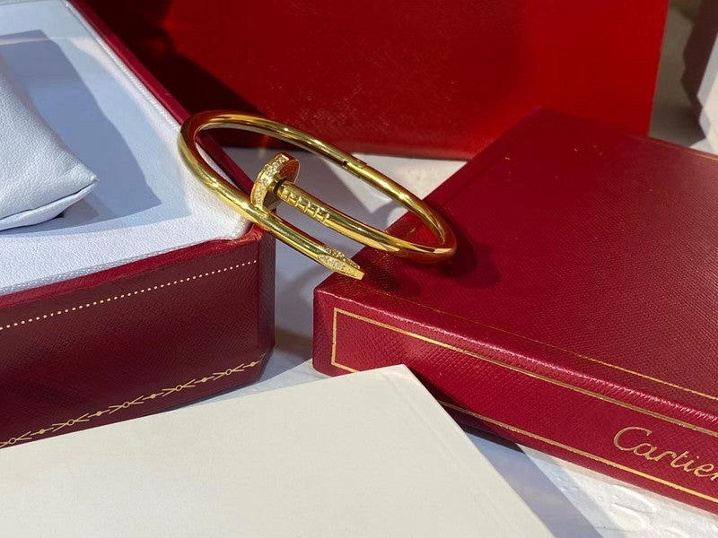 Side view of Cartier unisex jewelry piece