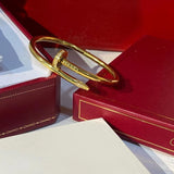 Side view of Cartier unisex jewelry piece