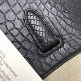 Side view of poised structured handbag