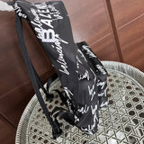 Back view of signature elevated women's handbag – women's statement bag
