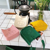  Signature shopper bag carried on shoulder