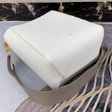 Side profile of classic modern women's handbag – women's luxury accessory