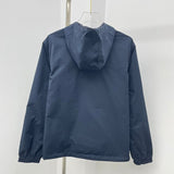 Back view of Louis Vuitton luxury clothing with tailored silhouette