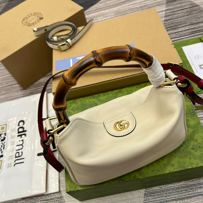 Styled lifestyle shot of structured statement women's handbag – women's luxury handbag