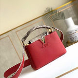 Front view of elevated polished women's handbag – women's luxury handbag