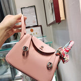  polished handbag styled with outfit