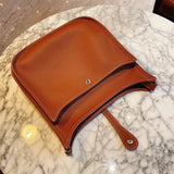  essential top-handle bag styled with outfit