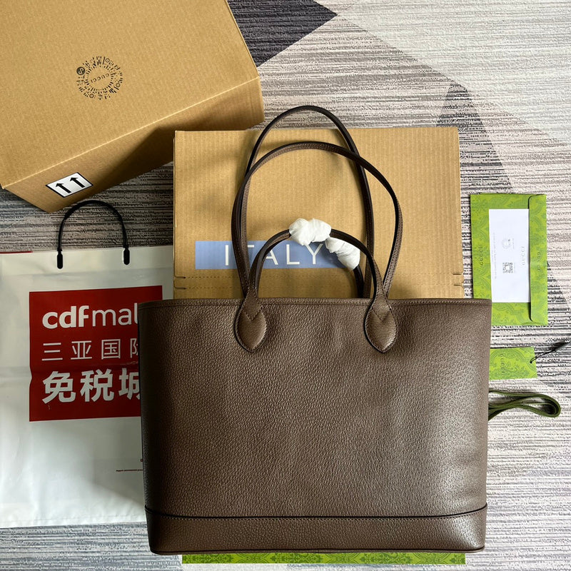 Front view of polished modern women's handbag – women's luxury accessory