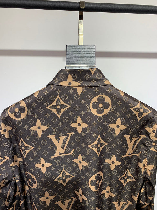 Flat lay presentation of Louis Vuitton cotton t-shirt with signature branding