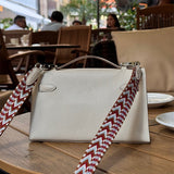 Side view of graceful structured handbag