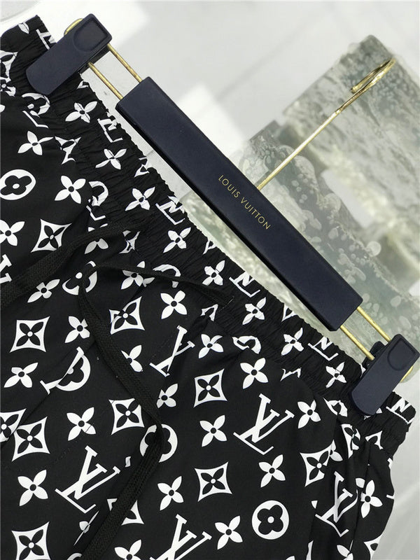 Flat lay presentation of Louis Vuitton cotton t-shirt with label-forward styling