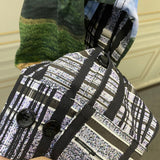 Back view of Louis Vuitton luxury clothing with streetwear-inspired cut