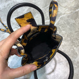 Modern Faux Leather Handbag - Signature Hardware Accents | Women's Statement Accessory #1050 - styled full view (image 7) of designer-inspired handbag