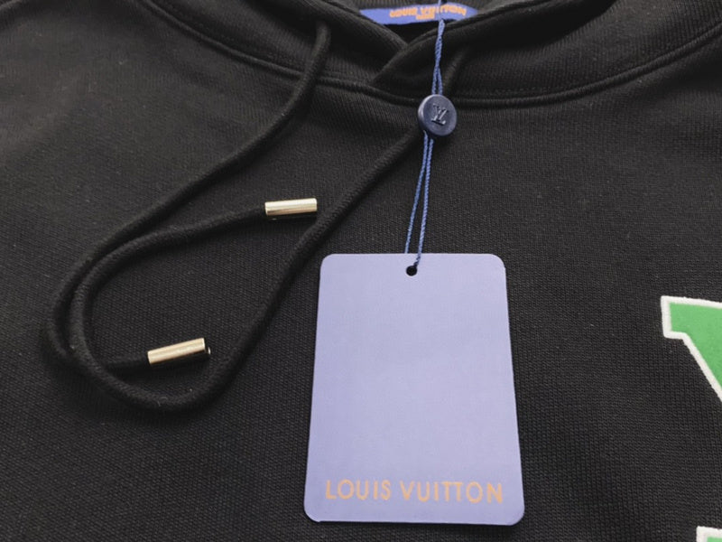 Front view of Louis Vuitton luxury clothing with contemporary cut