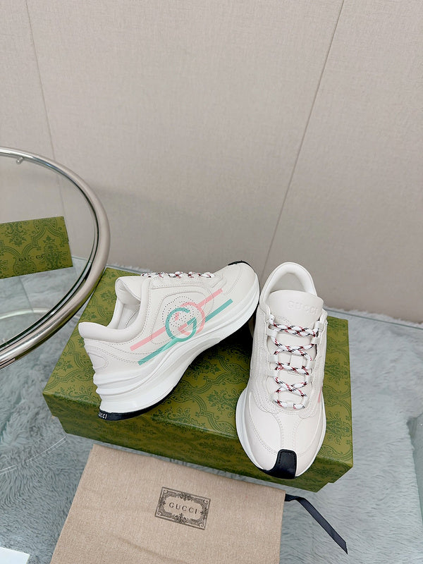 Side profile of Gucci soft grey sneakers classic court silhouette
