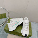 Side profile of Gucci soft grey sneakers classic court silhouette