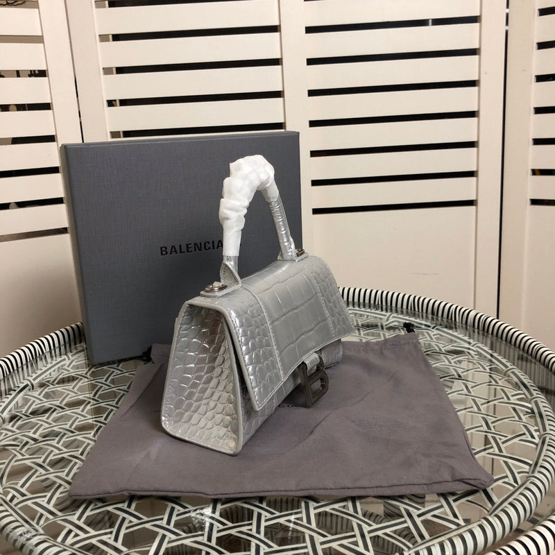 Styled lifestyle shot of modern classic women's handbag – women's luxury accessory
