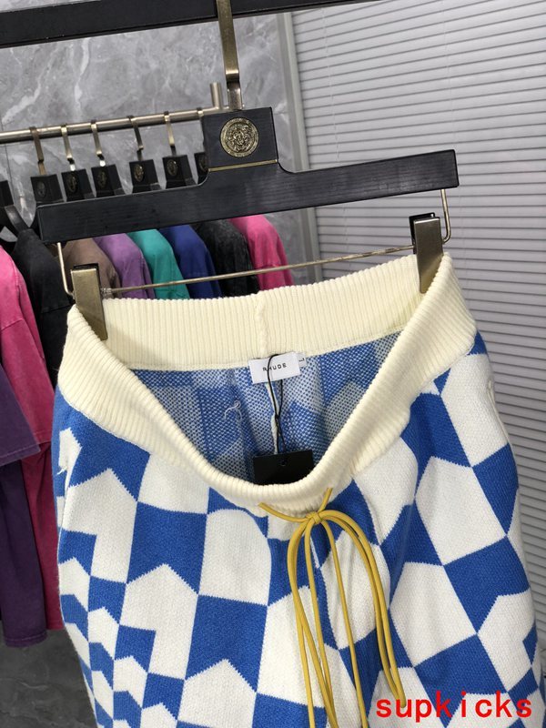 Close-up detail shot of Rhude luxury clothing with relaxed-fit cut