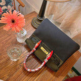 Fluid handbag styled for everyday wear