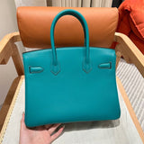 Side view of contemporary structured handbag