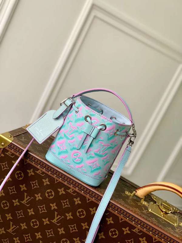 Side profile of structured signature women's handbag – women's designer-style accessory