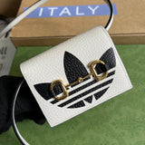 Close-up detail of polished statement women's handbag – women's statement bag