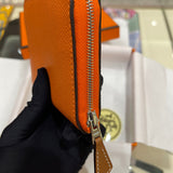 Side view of fluid structured handbag