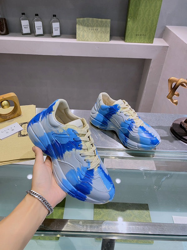 Side profile of Gucci two-tone sneakers breathable knit upper