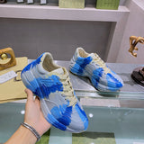 Side profile of Gucci two-tone sneakers breathable knit upper