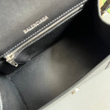 Side profile of sleek statement women's handbag – women's premium purse