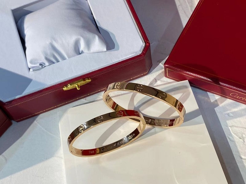 Side view of Cartier unisex jewelry piece