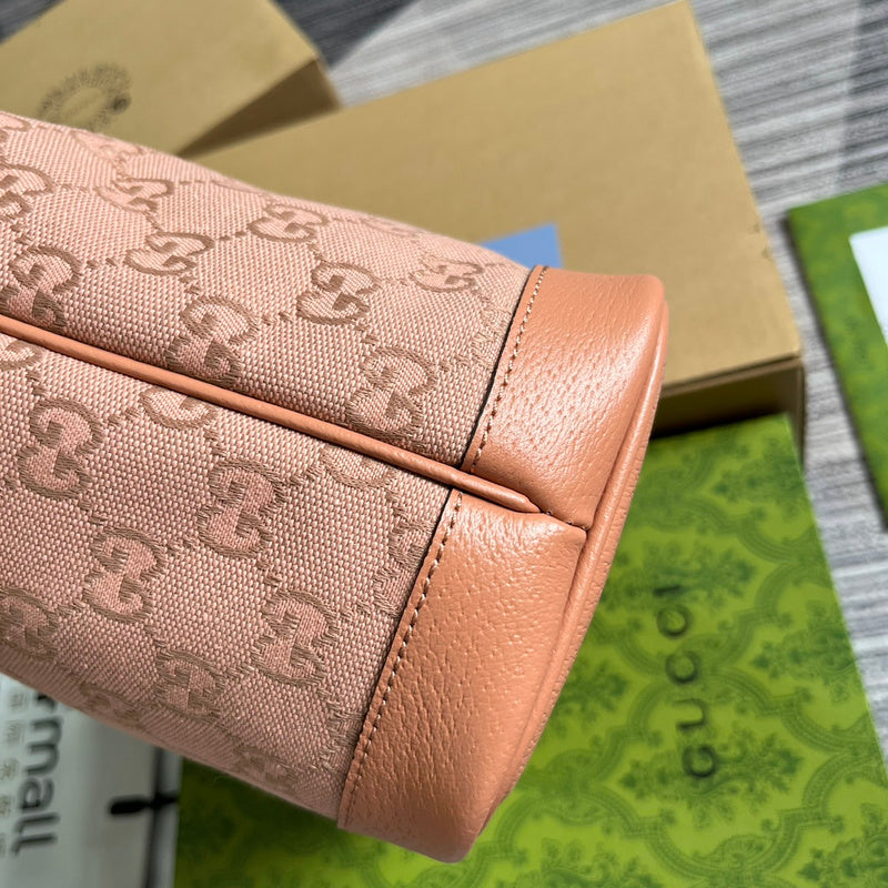 Styled lifestyle shot of chic signature women's handbag – women's luxury handbag