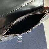 Styled lifestyle shot of sleek polished women's handbag – women's luxury accessory