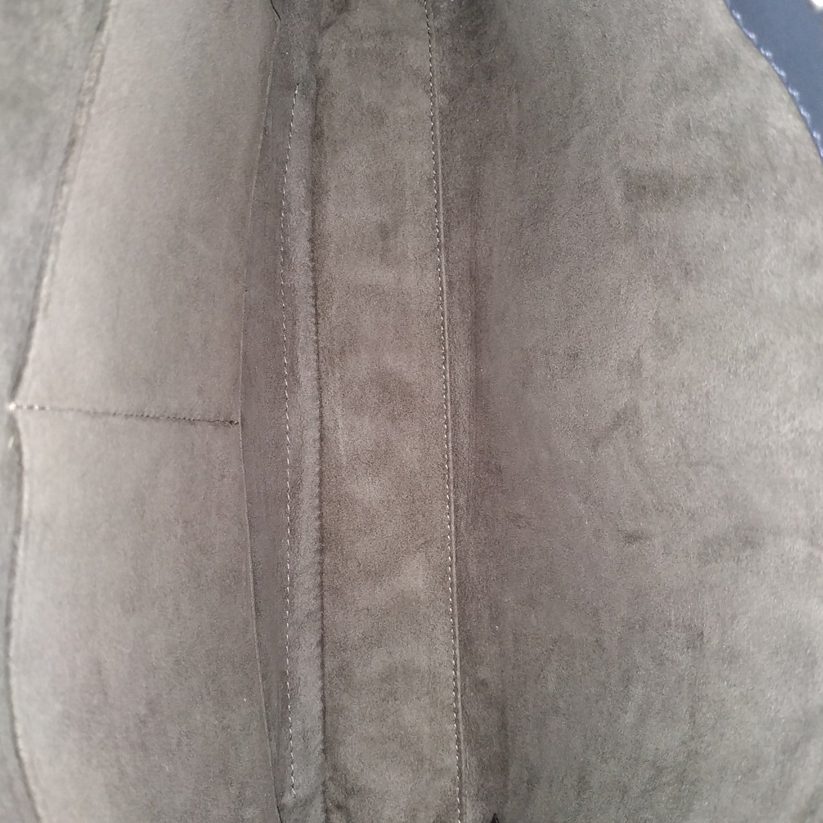 Close-up of DotCom bags hardware and fine stitching