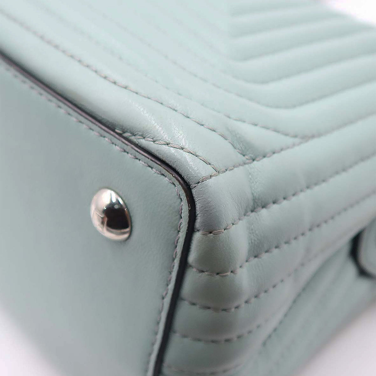 DotCom bags side profile designer luxury fashion