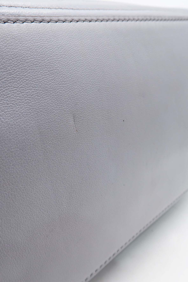 Close-up of DotCom bags hardware and fine stitching