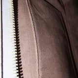 Close-up of DotCom bags hardware and fine stitching