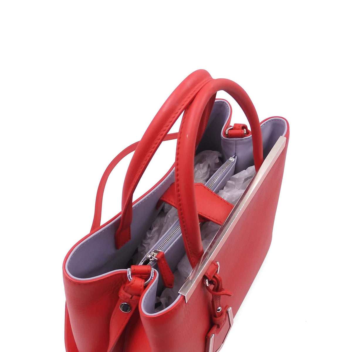 Close-up of Petite bags hardware and fine stitching