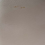 Close-up of Petite bags hardware and fine stitching