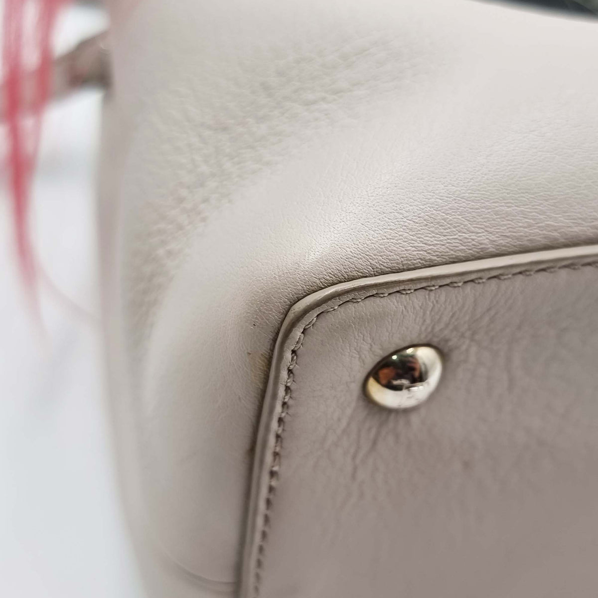 Petite bags side profile designer luxury fashion