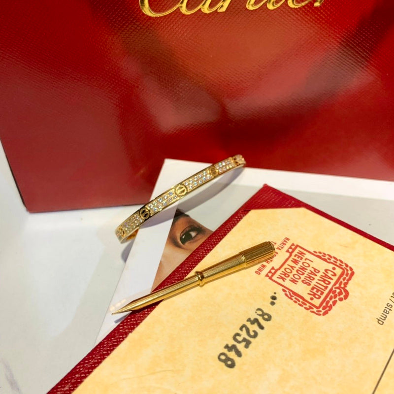 Side view of Cartier unisex jewelry piece