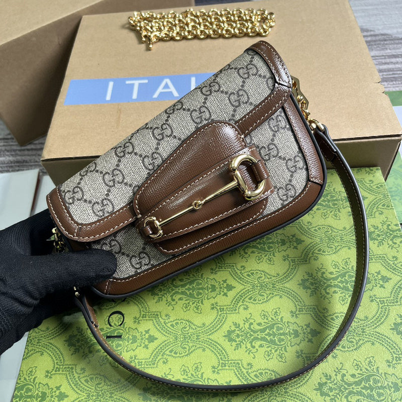 Handle and strap detail of sleek polished women's handbag – women's everyday handbag