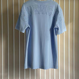 Side profile of Givenchy luxury clothing with logo-detail design