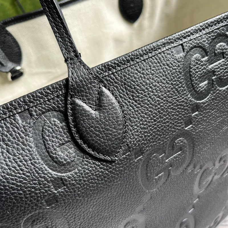 Styled lifestyle shot of refined statement women's handbag – women's luxury handbag