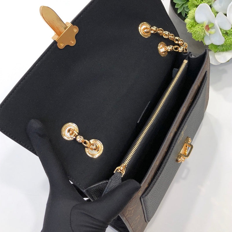 Side profile of statement refined women's handbag – women's designer-style accessory